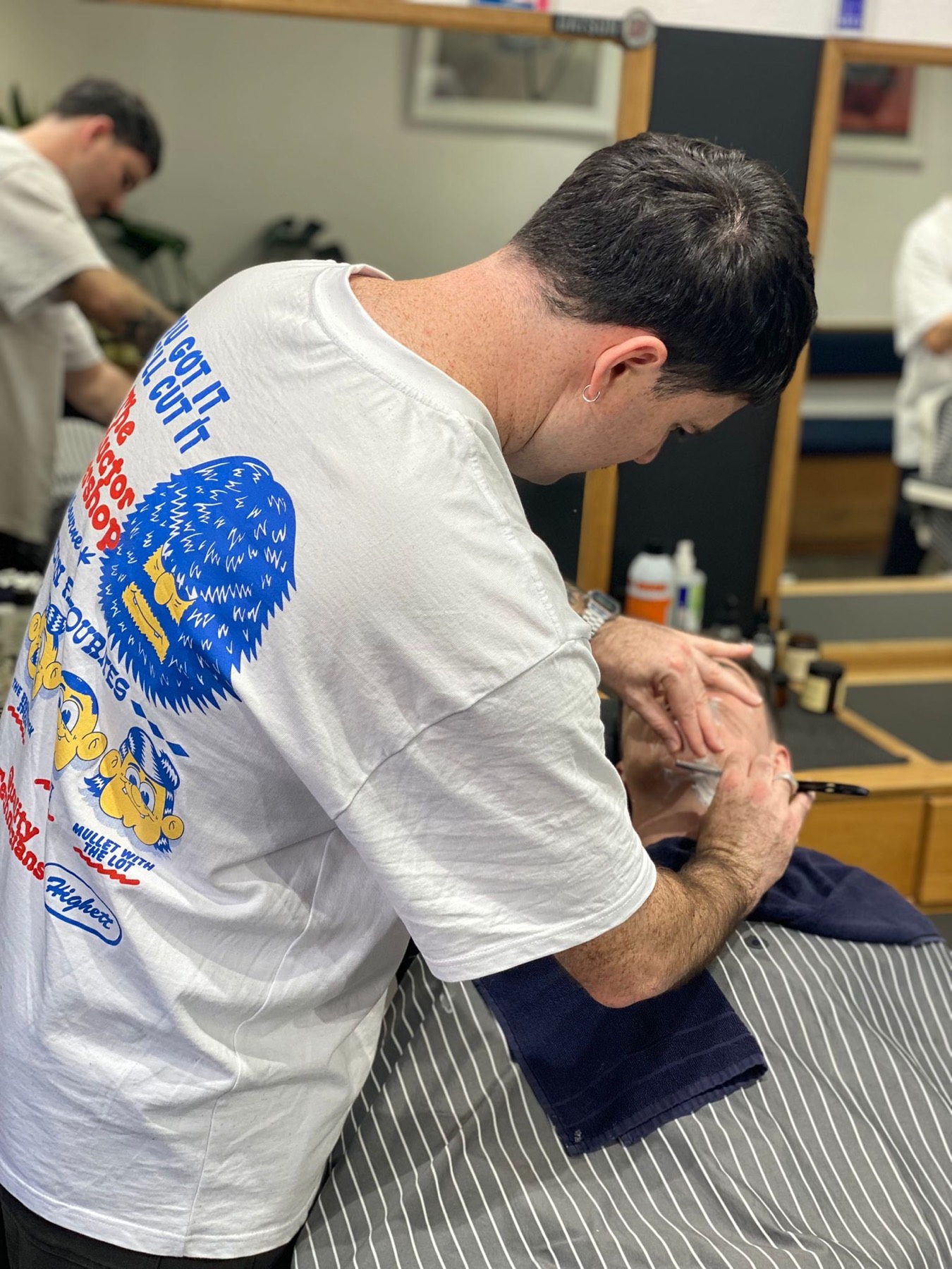 A Conductor barber at work